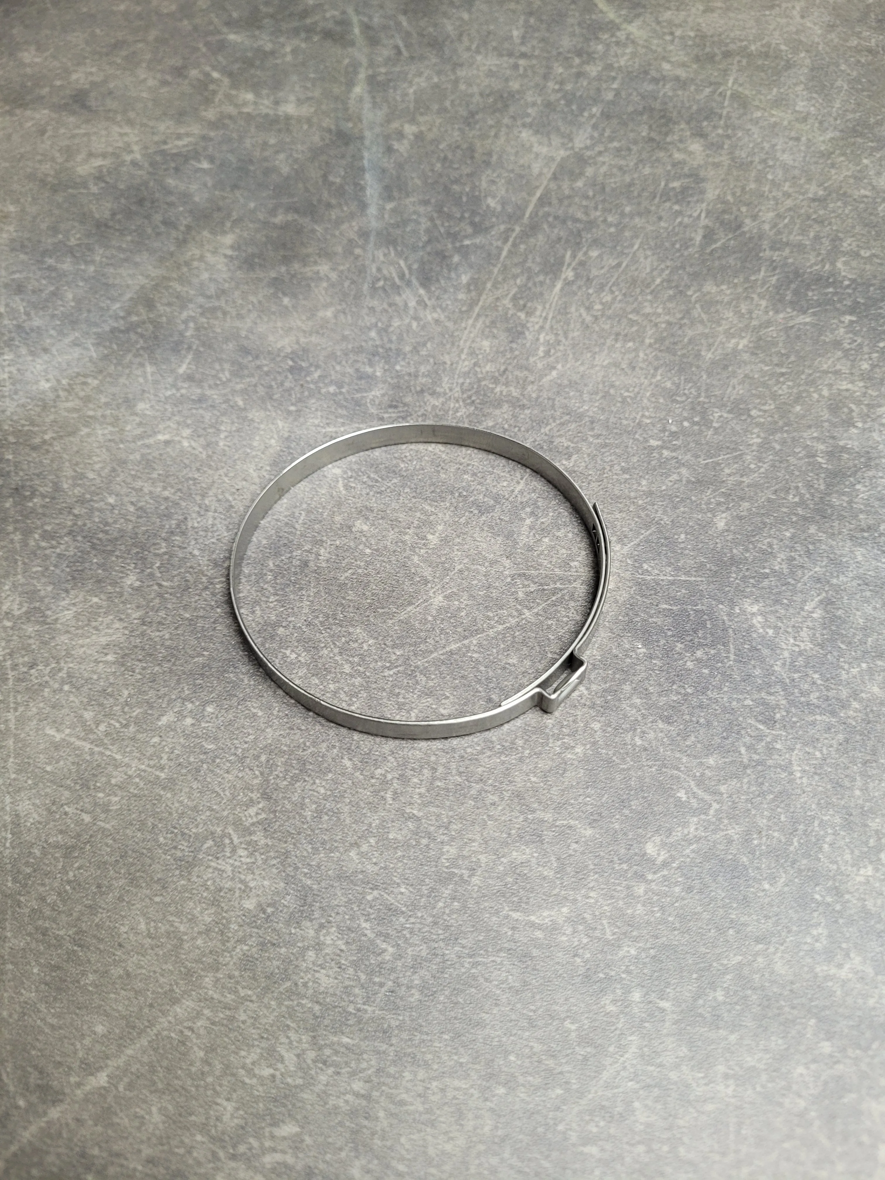 Хомут пыльника рулевой рейки [D=60.5-64] зажимный