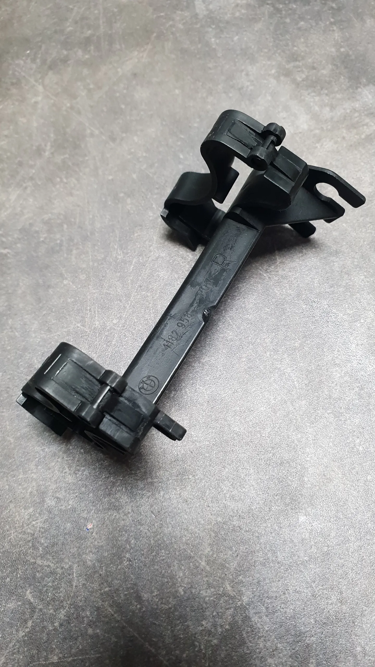 Кронштейн датчика ABS заднего правого рычага (бумеранга) E39/E60/E65