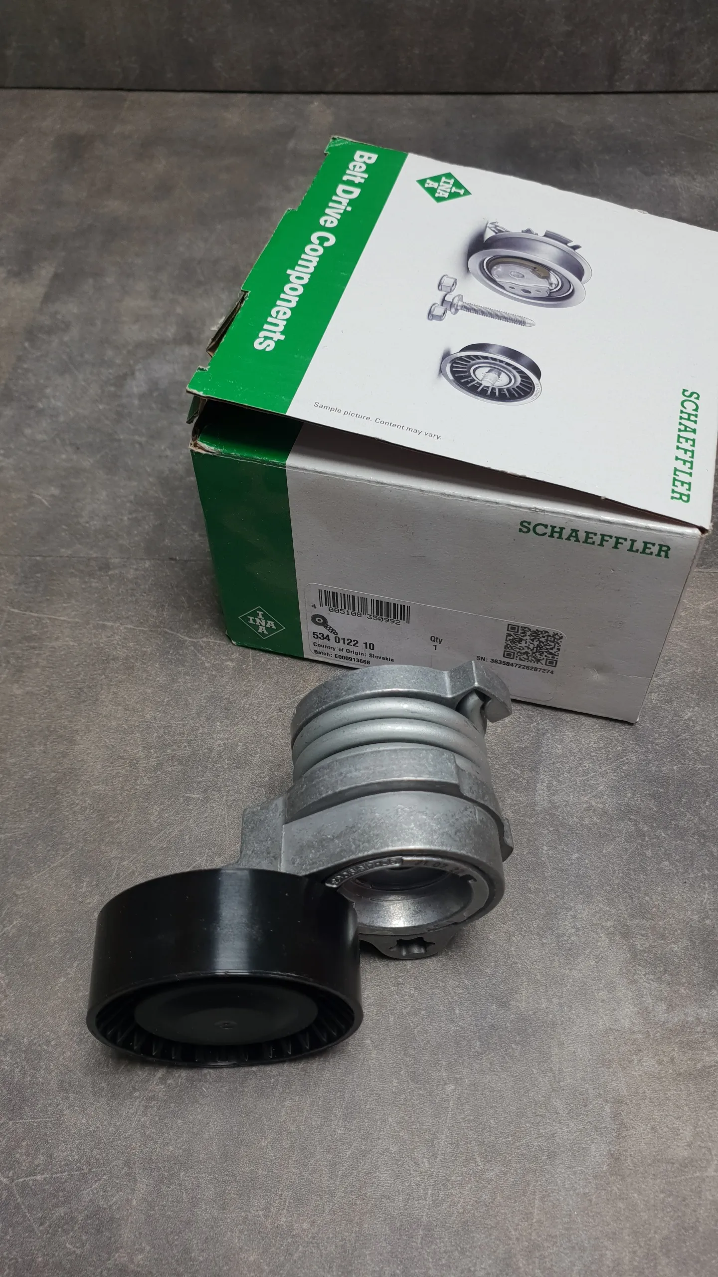 Натяжитель ремня N62 E60,E65,E53 [пружинный, с роликом]