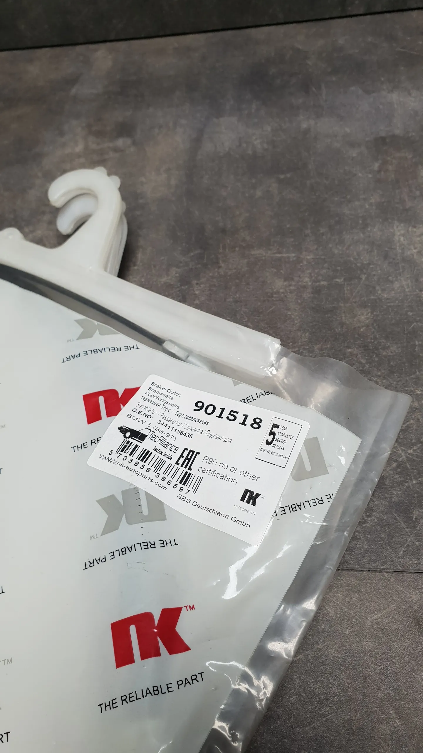 Трос стояночного тормоза Е34