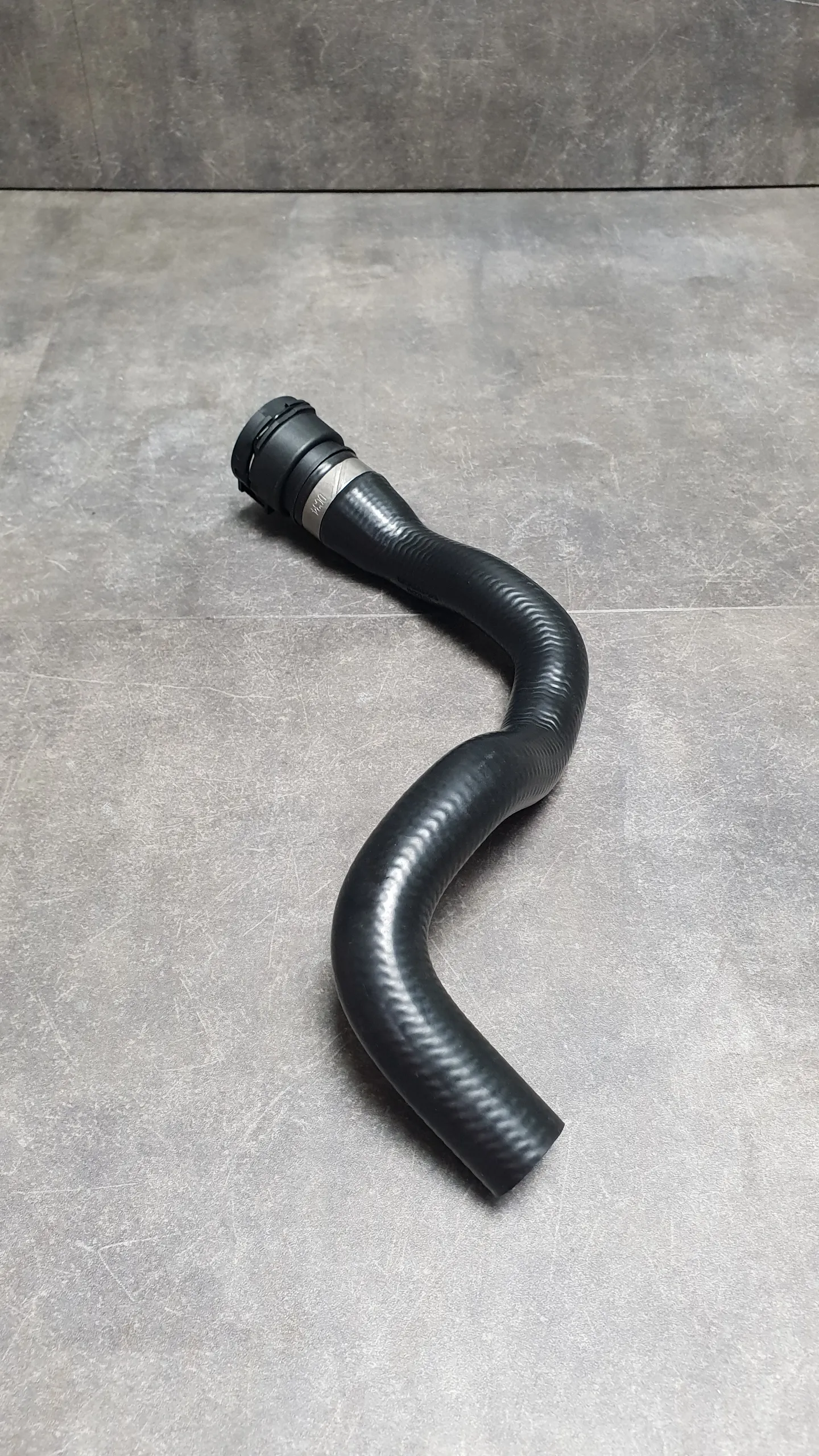 Патрубок системы охлаждения E46 (M43TU) [печка-фланец на блоке]